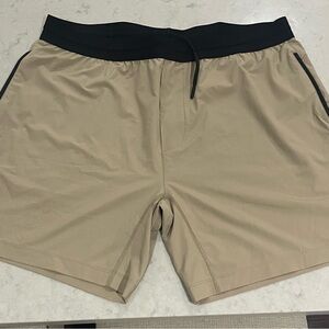 Rhone khaki running shorts XL 6.5" inseam really soft & comfy. EUC worn 4 times